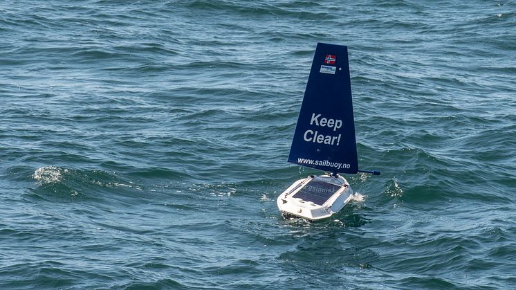 The autonomous sailbuoy powered by the wind and sun collecting data at Hywind Scotland.