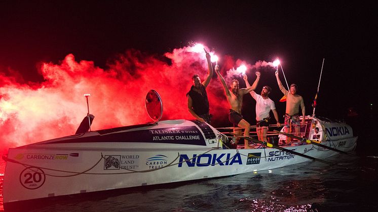 Carbon Zerow, sponsored by Ocean Signal, celebrate after finishing the 2017/18 Talisker Whisky Atlantic Challenge. Credit: Ted Martin