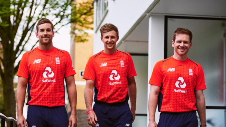 Dawid Malan (left), Joe Root and captain Eoin Morgan model England’s red shirt they will wear against Scotland