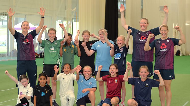 Members of the England cricket team enjoy a day's training with 11 lucky competition winners as part of Heather's Pride