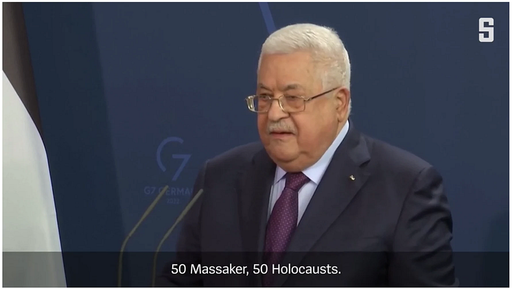 Screen shot of Mahmoud Abbas' making the controversial comments alongside German Chancellor Olaf Scholz
