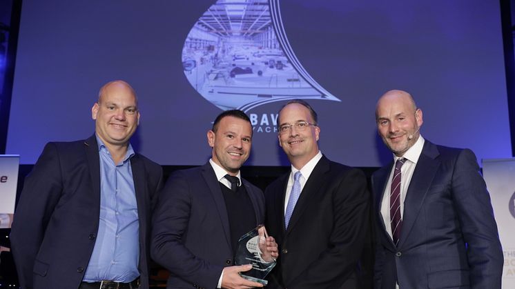 Dometic USA's Ned Trigg, Executive Vice President, Marine division (second right), presents the Innovation in a Production Process award to Bavaria Yachtbau at the IBI METSTRADE Boat Builder Awards