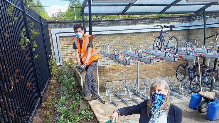 Let's bee friends: Groundwork East’s Matt Sutcliffe and Sandy Station Manager Fiona Blackwell prepare for World Bee Day