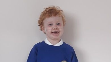 Miracle: Kaleb Lewis, aged four, marks a significant milestone of starting school after the amazing efforts of the team at the Birmingham Women's and Children's NHS Foundation Trust where he was monitored as part of the RAPID Project