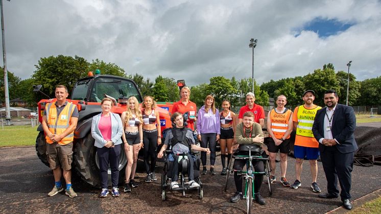 Athletes welcome the replacement of the running track, with (far right) Cllr Tamoor Tariq.