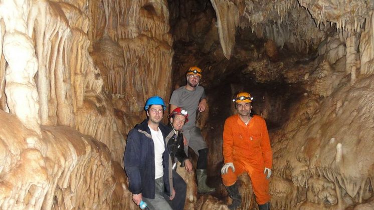 Researchers in a cave