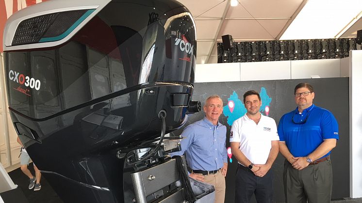 Joel Reid, Global Sales Director at Cox Powertrain (middle) with Rick Chapman, Marine Engine Consultant (far left) and  Keith Moore Vice President, New Engine Business Manager (far right) at Ring Power Coporation