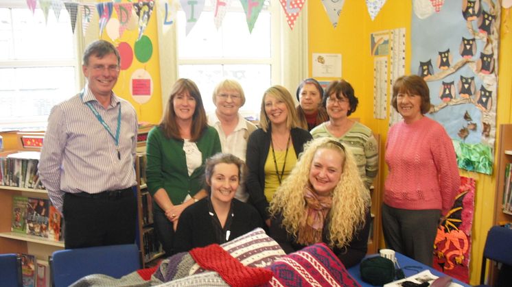 Radcliffe Library knitters raise money for Bury Hospice