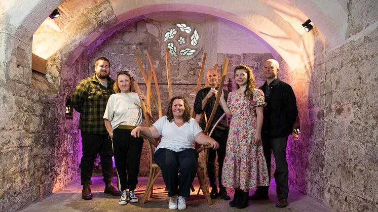 With the Story Chair are Andrew Weatherhead and Pearl Saddington from the National Trust, Dawn Harrison from Changing Lives, Jon Canessa from Newcastle Cathedral, Dr Angelika Strohmayer from Northumbria University and furniture maker, Nick James.