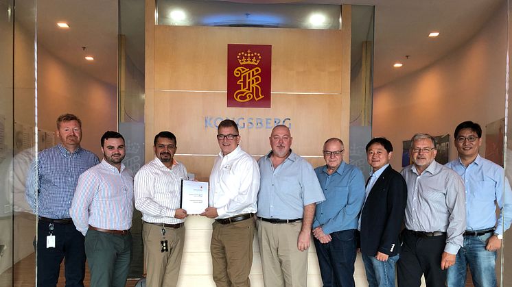 The KONGSBERG and Tidewater Marine Project Team celebrate the signing of their landmark contract at Kongsberg Maritime’s Singapore headquarters