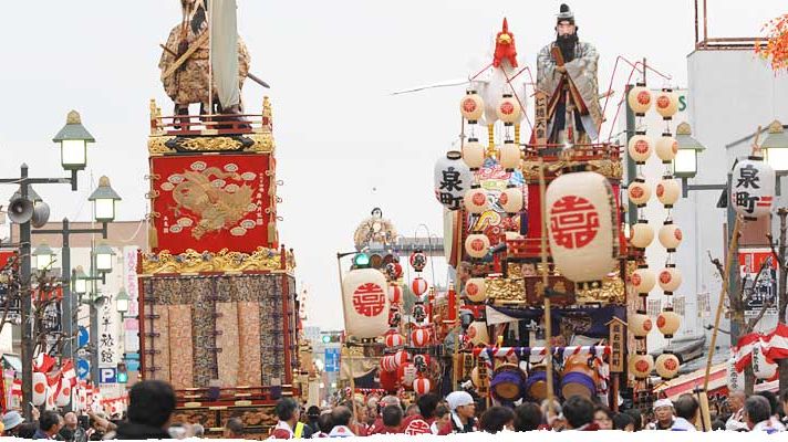Gorgeously decorated dashi floats during the daytime parade