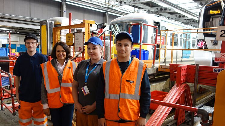 Apprentices (from left) Connor Philpot, Rosie-Jayne Wile and William Webster with MP Catherine West in Hornsey Depot