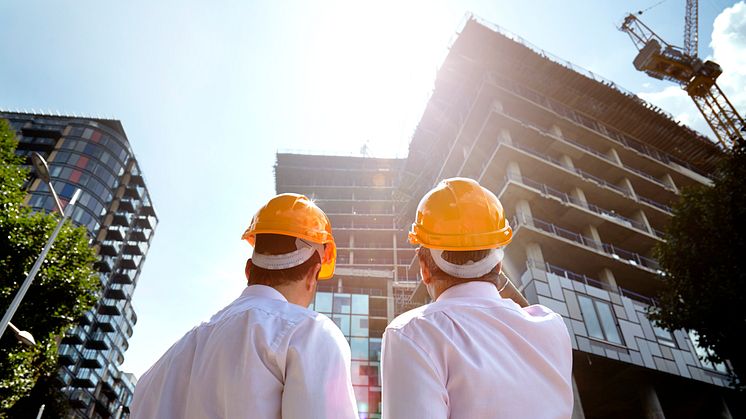 architects-hardhats-building-construction-getty-510519943.jpg