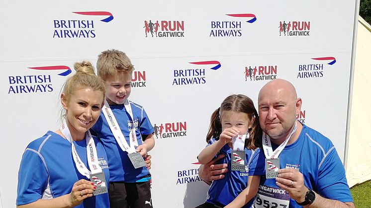 Crawley dad James Loye pictured with his family after a run - more pictures available to download below