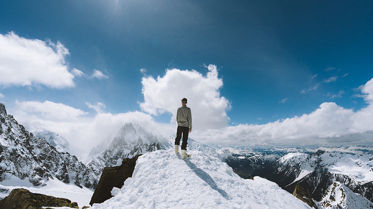 person-standing-on-slope-glacier-mountain-1081111