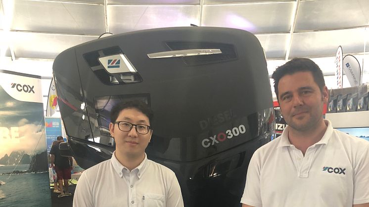Sungho Hong, Vice President of SoungJin Marine Co. Ltd with Cox Powertrain’s Global Sales Director, Joel Reid at Miami International Boat Show 2018