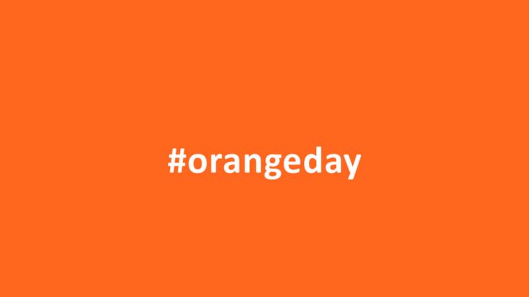 Orange bakgrund med hashtag och texten orangeday för uppmärksamhet