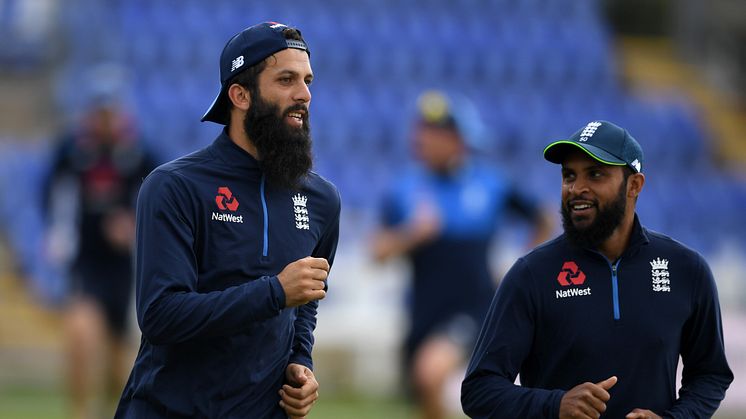 England’s Moeen Ali (L) and Adil Rashid