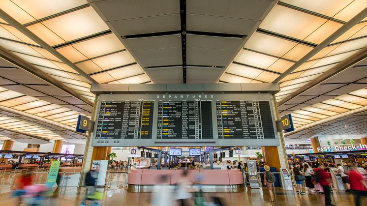 Changi Airport's flight information display flip board at Terminal 2