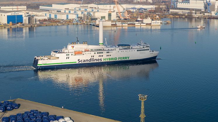 Scandlines hybrid ferry Copenhagen with rotor sail leaving the port of Rostock