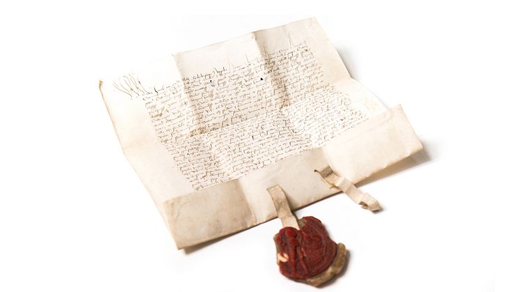 The charter for the establishment of Uppsala University issued by the Council of the Realm in Strängnäs at the beginning of July 1477, written in Swedish.  Photo: Kurt Eriksson, Swedish National Archives