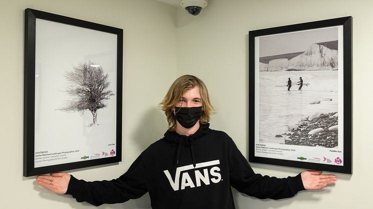 Worth the wait: Josh Elphick, Young Landscape Photographer of The Year, at his exhibition in Burgess Hill station's new waiting room