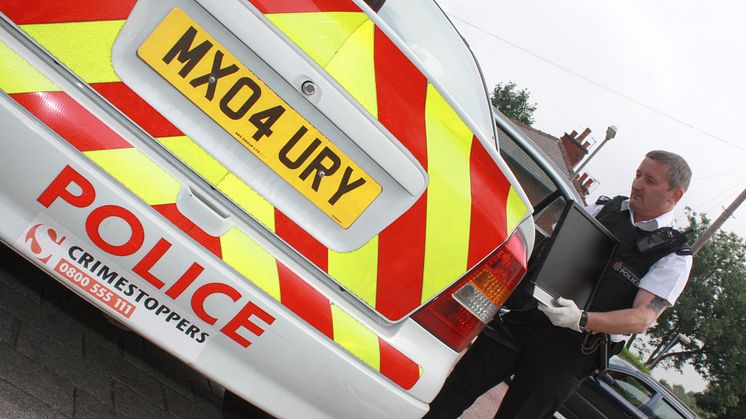 A man was knocked unconscious as he was robbed in Holcombe Brook. 