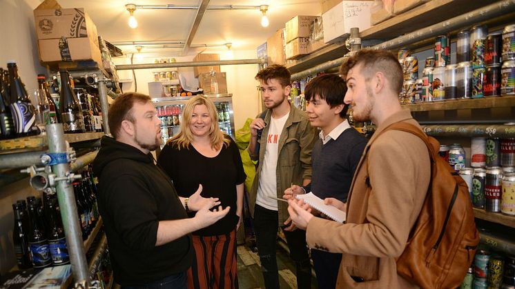 Paul Hughes, MD of Beer Box at the STACK, with Kellie Forbes-Simpson, lecturer in entrepreneurship and EBM students Simon Better, John Nichols and Tyler Smee.