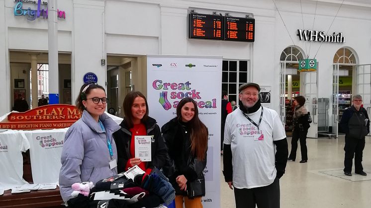 Volunteers last year collecting sock donations at Brighton station