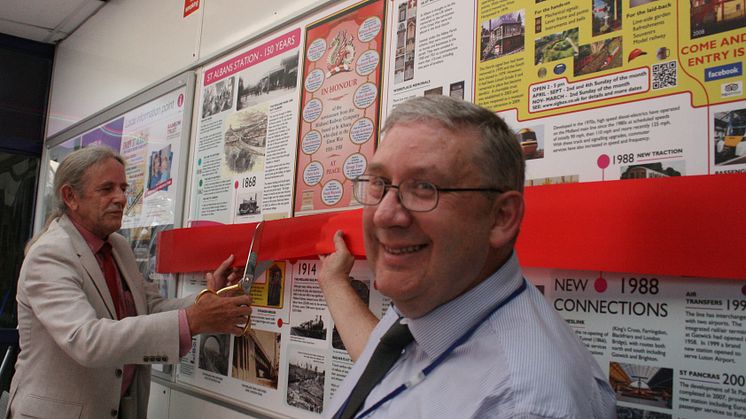 A ribbon cutting marks the unveiling of the history panel at St Albans City station