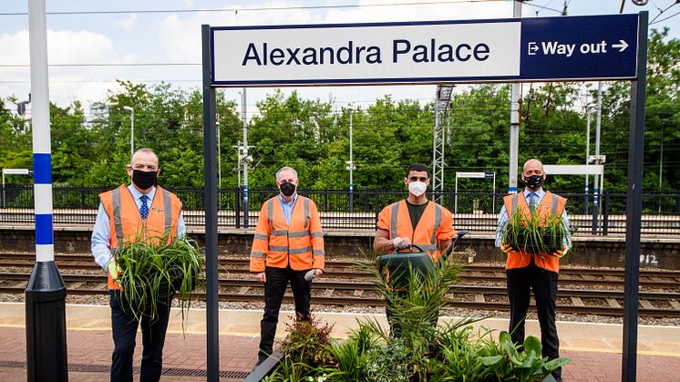 Rail Minister Chris Heaton-Harris joins Thameslink and Great Northern MD Tom Moran (far right), Groundwork London's Director of Youth Employment and Skills Graham Parry and Kickstart trainee Abdallah Ghanmi (with watering can)