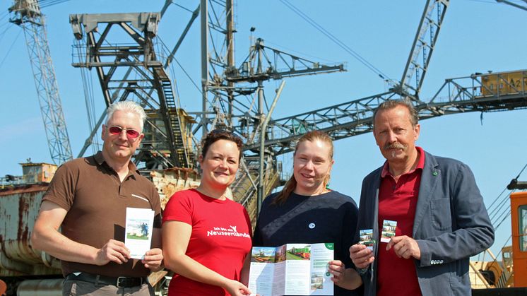 Thorsten Hinz (Bergbau-Technik-Park e.V.), Daniela Kuhnert (Leipzig Tourismus und Marketing GmbH), Teresa Schneidewind (MUT e.V., Brikettfabrik Herrmannschacht) und Dr. Karsten Waldenburger (Verein Kohlebahnen e.V.) bei der Präsentation (v.l.)