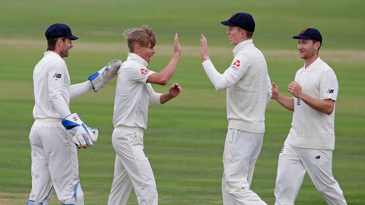 Sam Curran celebrates a wicket on day two of the England Lions game against Australia XI