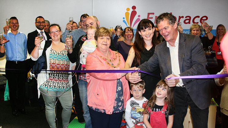 I declare this centre open: MP Stephen Lloyd with Embrace founder Rebecca Whippy (to his left, flanked by the local Mayor), cut a ribbon on a new children's therapy centre next door to Eastbourne railway station