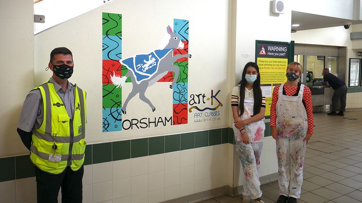 Horsham Station Assistant Mike O'Grady with mural artists Ayseli Sunguroglu (centre) and Laura Hutchins (right)