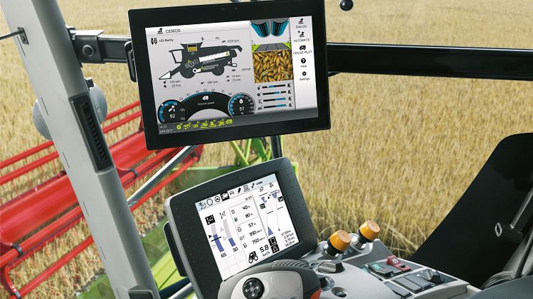 CEMOS AUTO THRESHING adjusts the threshing concave clearance and the threshing drum speed in tangential threshing units, adapting automatically to the prevailing threshing conditions. Photo: CLAAS