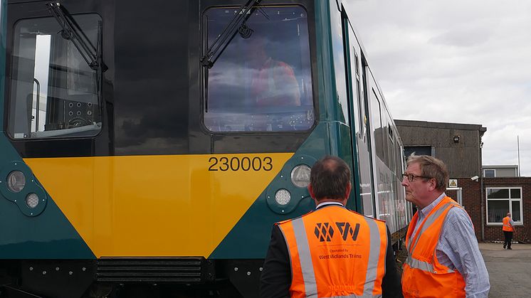 Jan Chaudhry-van der Velde and Adrian Shooter at Long Marston to unveil with special livery for the upcoming Class 230 units