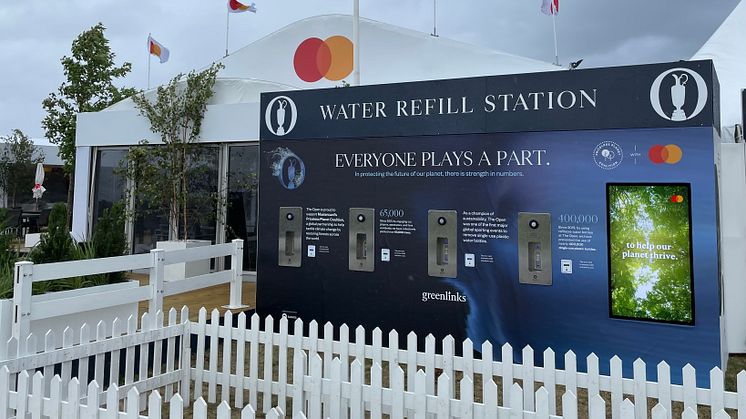 Massive Bluewater Water Wall with dispensers and digital content screen at 2023's The Open in Royal Liverpool Village