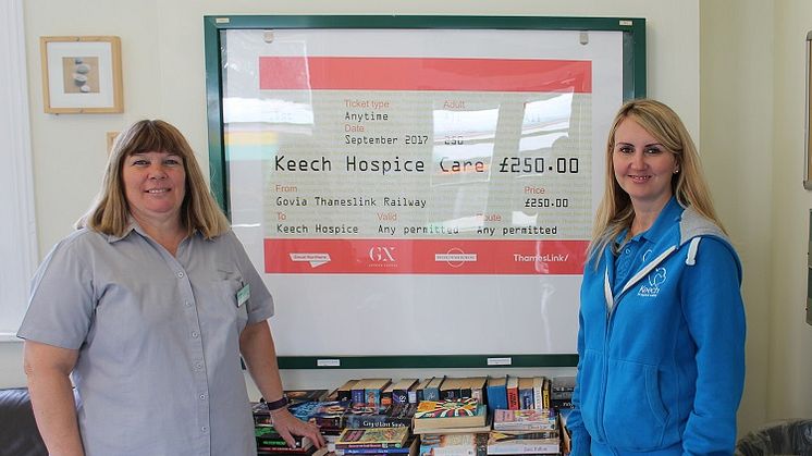Whyteleafe station's charity book-swap:  GTR Station Sales Clerk June Henty (left) presents £250 to Caron Hooper, Corporate Partnerships Fundraiser for Keech Hospice Care