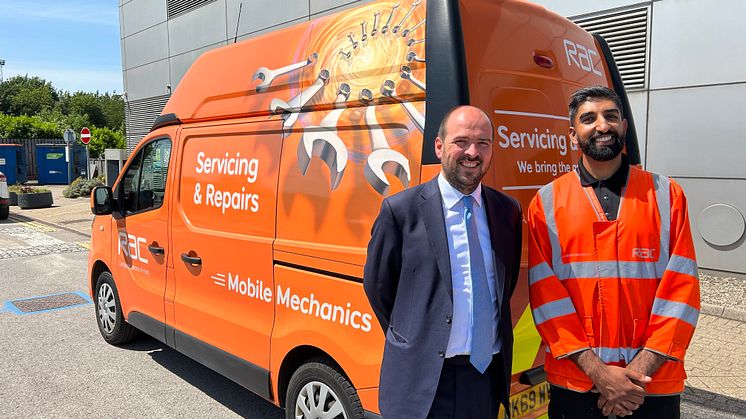 Minister for Roads and Buses Richard Holden with RAC Mobile Mechanic Indy Singh
