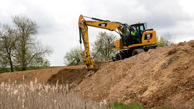 Cat M317F hjulgrävare i arbete