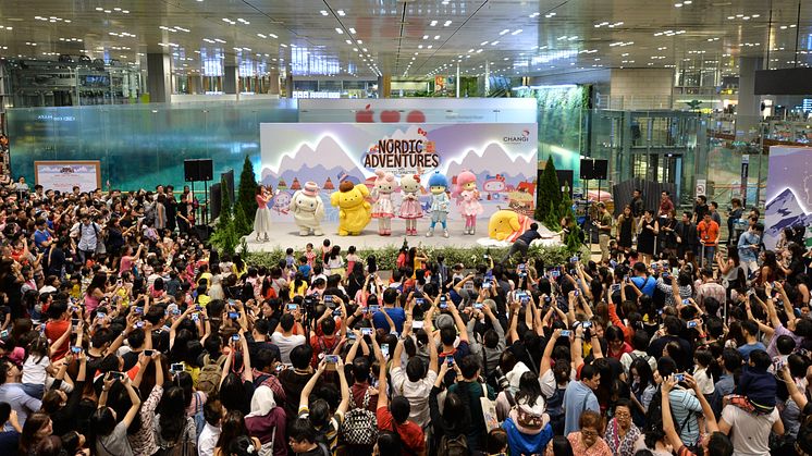 Crowd at the launch of Changi Airport's mid-year holiday festivities with beloved Hello Kitty & Friends