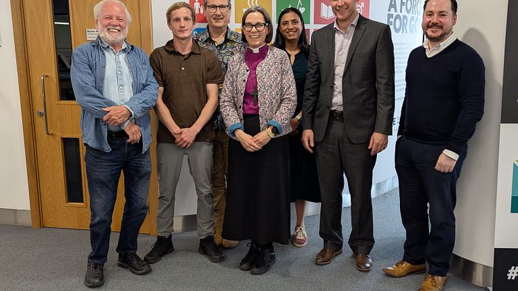 Group photo of experts who convened for a roundtable discussion on the social economy. 