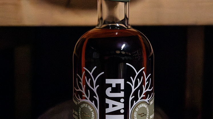 Bottle on cask.png