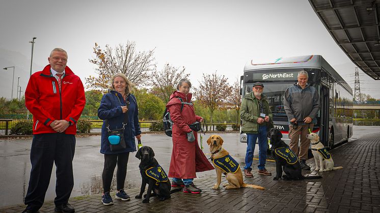 (Pictured from left to right: Go North East driver – Paul Frazer, Ashby with puppy raiser Audrey, Viva with puppy raiser Marie, Harvey with puppy raiser Paul and Esmay with puppy raiser Mark)