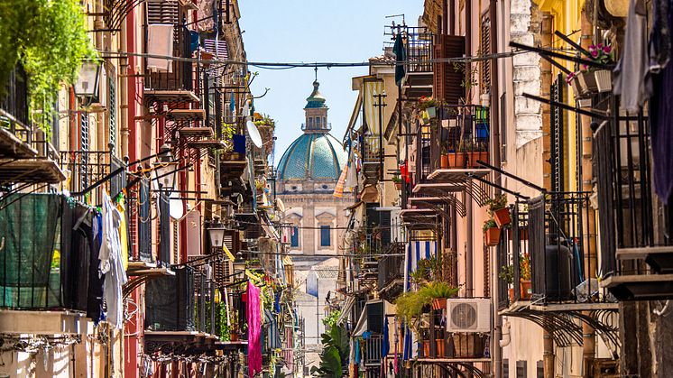 narrow-street-palermo-sicily-italy-getty-images-1178373302.png