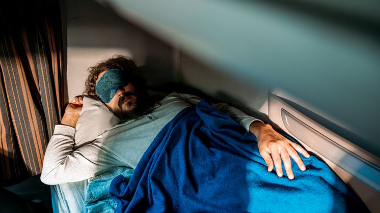 THEME_PEOPLE_SLEEPING_CABIN_GettyImages-1341970685_Universal_Within usage period_81959.jpg