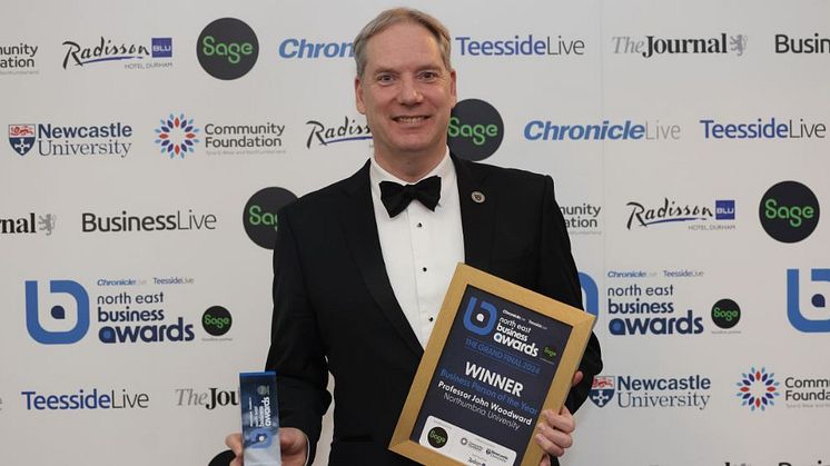 Professor John Woodward with his Business Person of the Year award. Image credit: Claire McKie-Reid, Newcastle Chronicle.