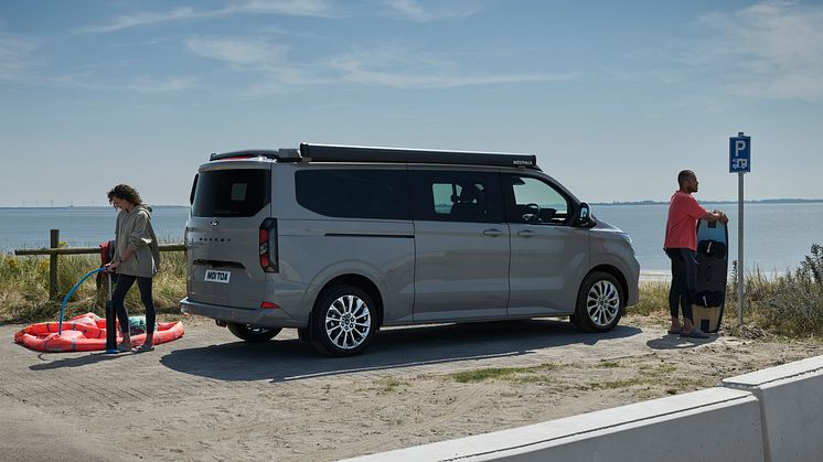 2024FordTransitNuggetLWBTitanium_3_3-4_rear_Talents.jpg