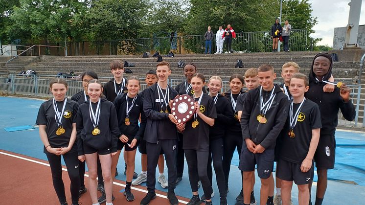 Students from Eastbank Academy celebrate their win at the 2024 ng Classics Athletic final. 